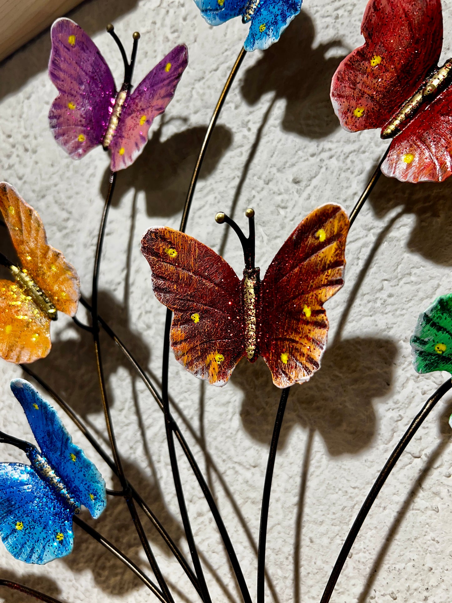 Cornice in legno con farfalle