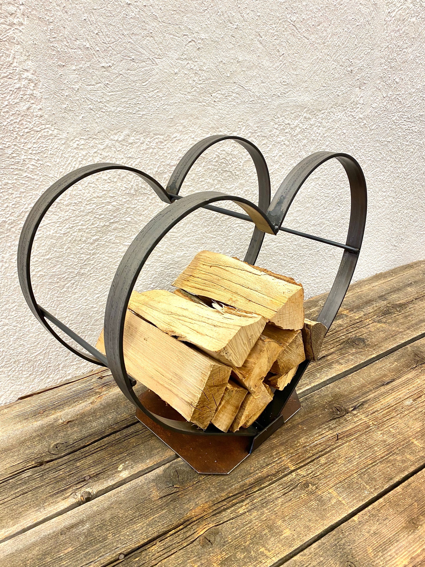 Heart-shaped firewood holder