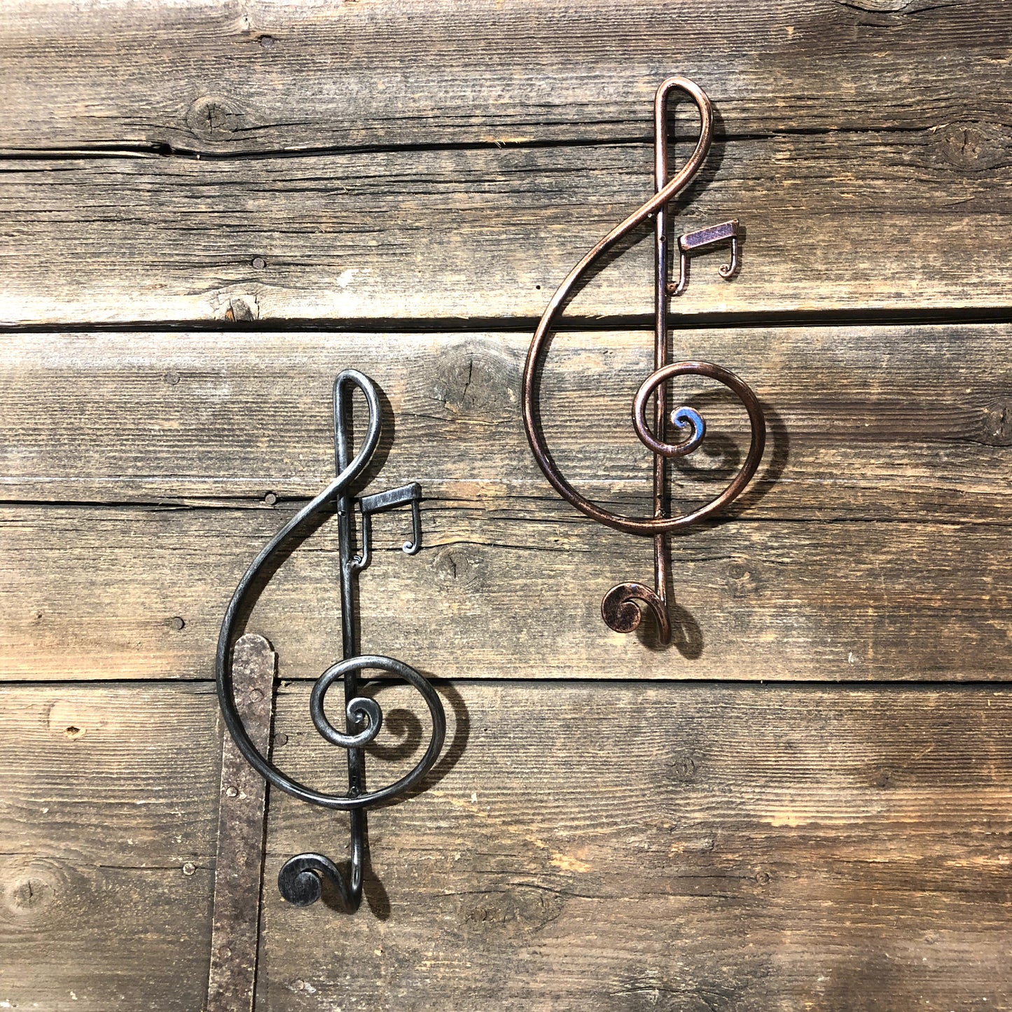 Treble clef coat hanger