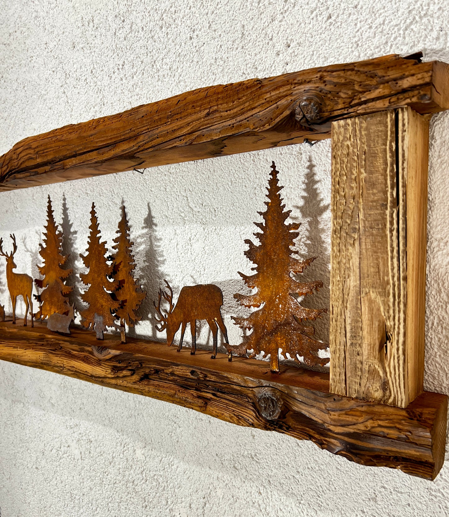 Cornice con animali e alberi in Corten