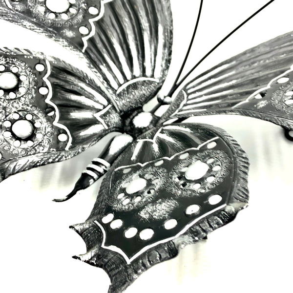 Farfalla cesellata in ferro battuto
