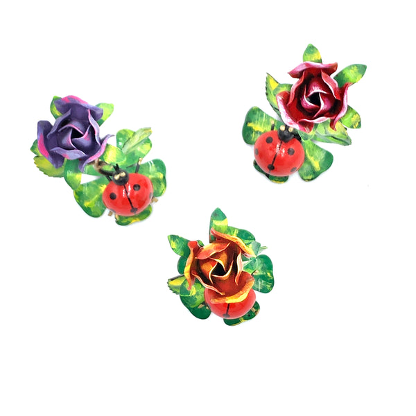 Coccinella con rosa