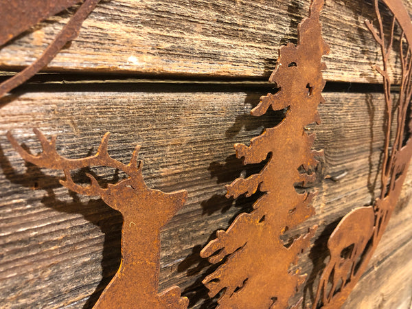 Cervo e albero con cornice ovale