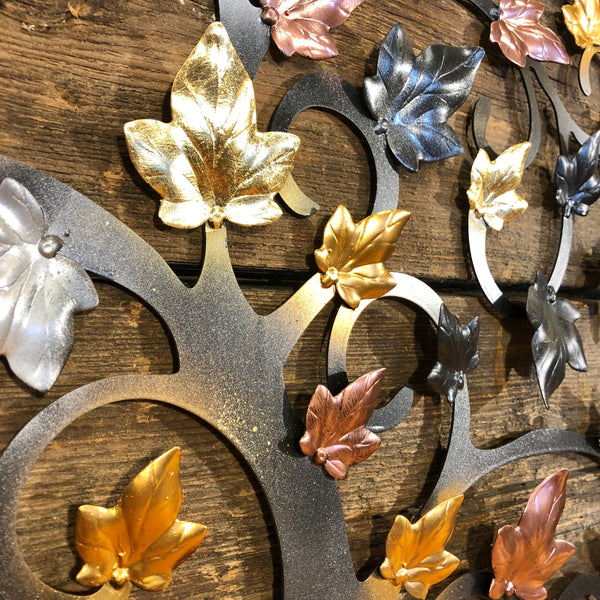 Albero della vita con foglie d'edera oro, argento e rame