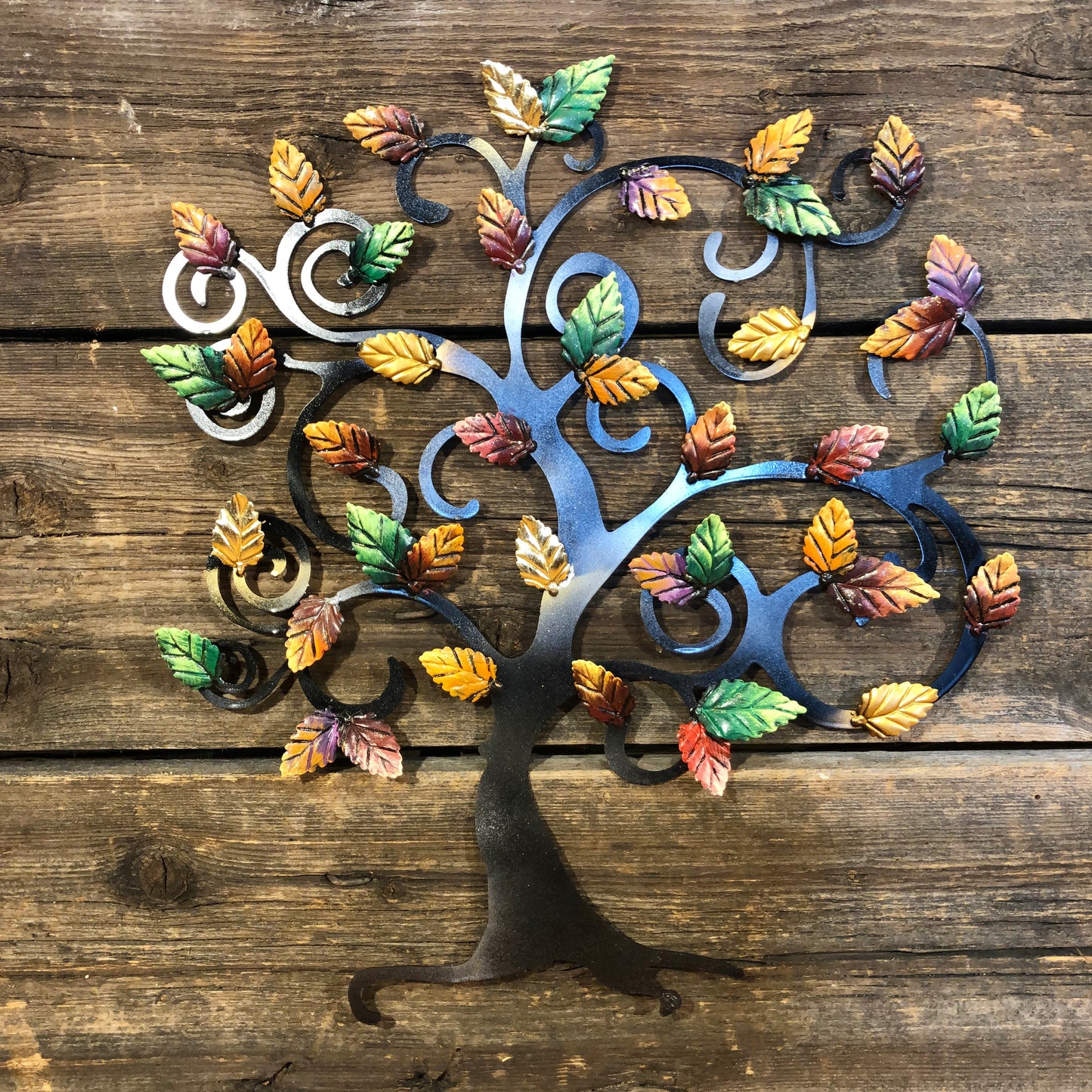 Tree of life with autumn and green beech leaves