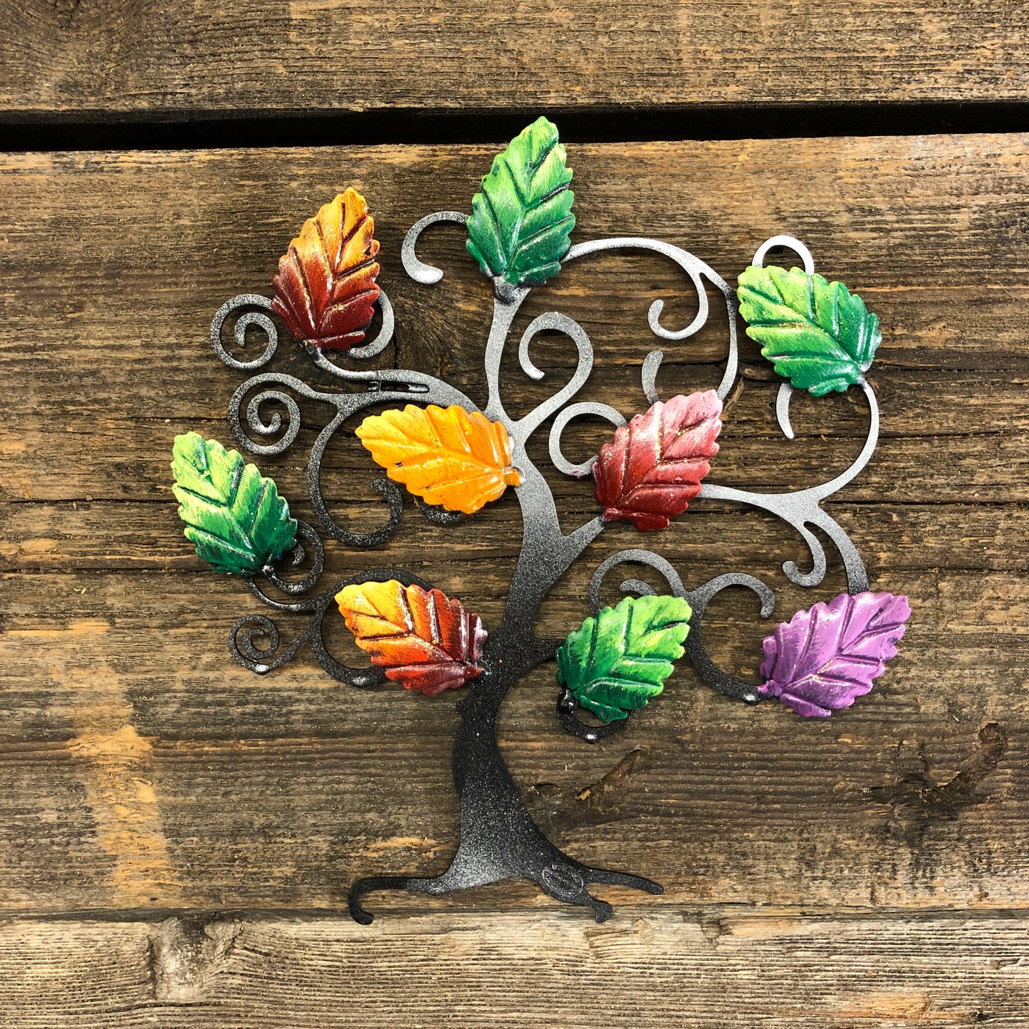Tree of life with autumn and green beech leaves